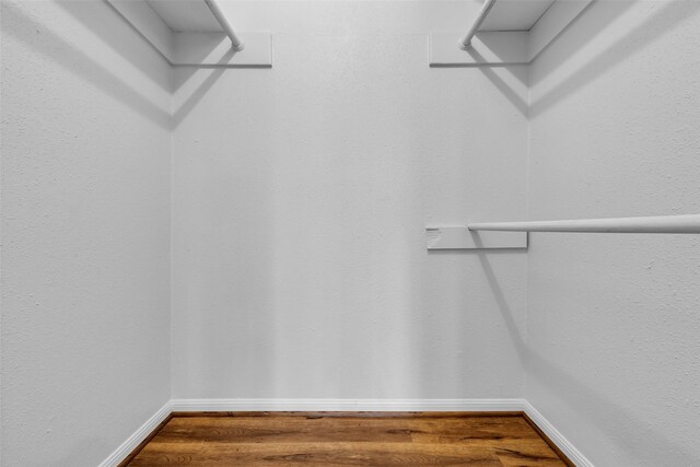 6437 Bayou Glen Rd, Houston, TX 77057 - spacious closet with wood finished floors