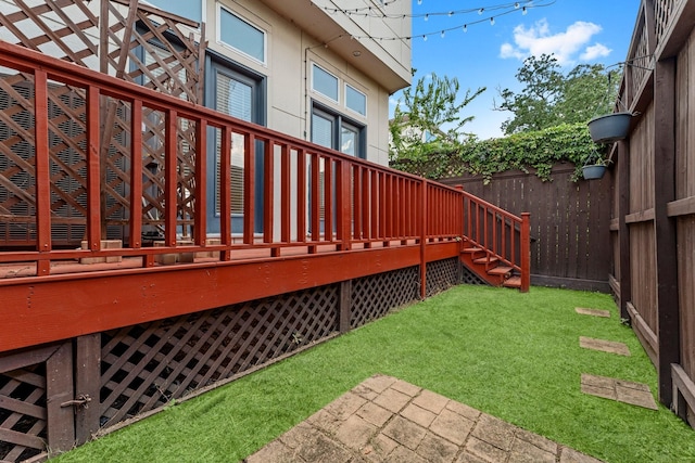 1038 E 29th St, Houston, TX 77009 - fenced backyard featuring a wooden deck