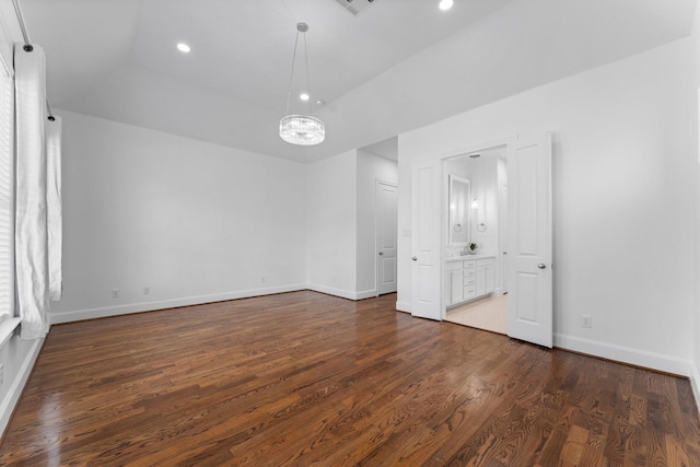 1038 E 29th St, Houston, TX 77009 - spare room featuring a chandelier, dark wood finished floors, and recessed lighting