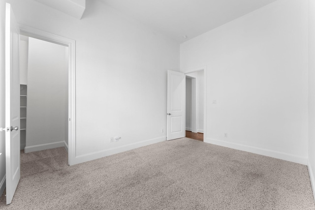 1038 E 29th St, Houston, TX 77009 - unfurnished bedroom featuring carpet flooring and baseboards