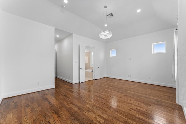1038 E 29th St, Houston, TX 77009 - unfurnished room featuring wood finished floors, a chandelier, and recessed lighting