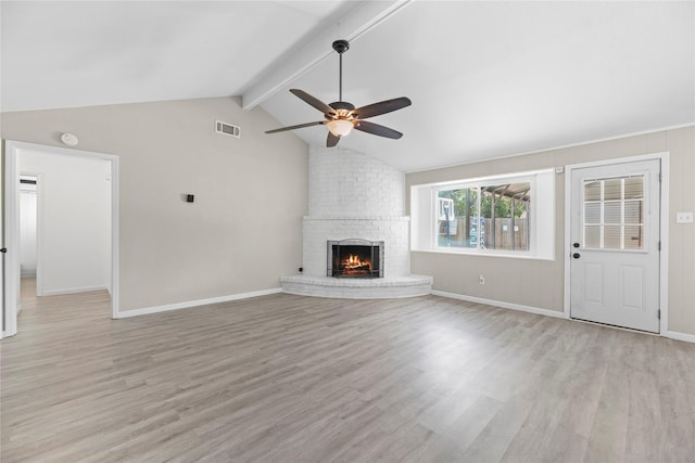 12211 Pine Knoll Dr, Houston, TX 77099 - unfurnished living room featuring light wood-type flooring, ceiling fan, and a brick fireplace