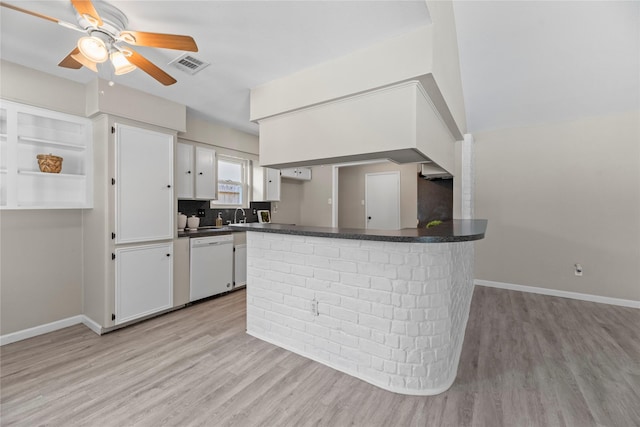 12211 Pine Knoll Dr, Houston, TX 77099 - kitchen with dishwasher, light wood finished floors, ceiling fan, white cabinetry, and dark countertops