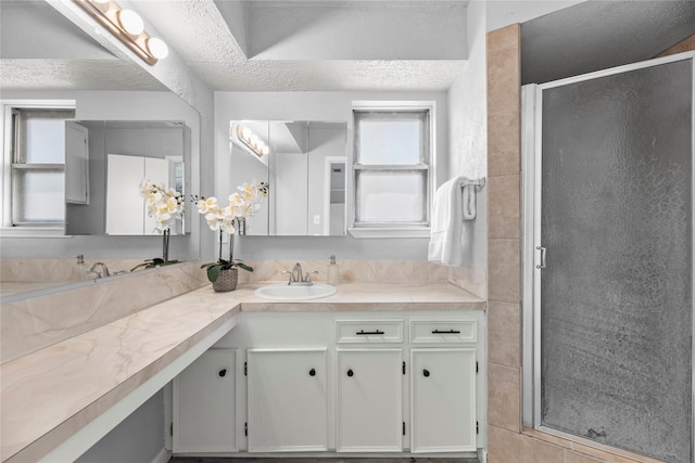 12211 Pine Knoll Dr, Houston, TX 77099 - bathroom featuring vanity and a stall shower