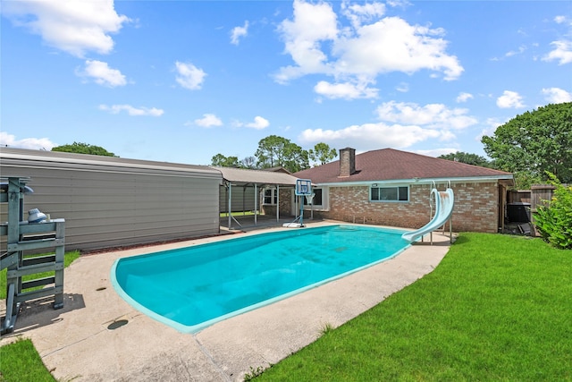 12211 Pine Knoll Dr, Houston, TX 77099 - swimming pool with a water slide and a patio