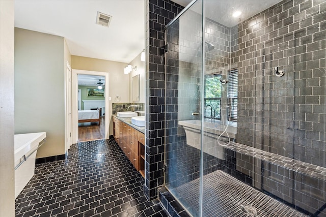 1731 Marshall St, Houston, TX 77098 - bathroom featuring double vanity, ensuite bath, a shower stall, and a ceiling fan