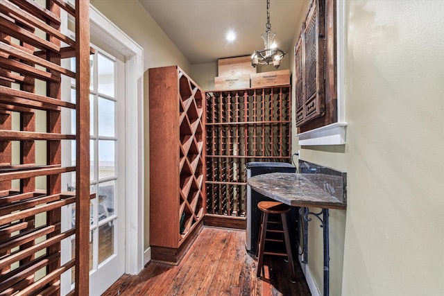 1731 Marshall St, Houston, TX 77098 - wine area with dark wood-type flooring and recessed lighting