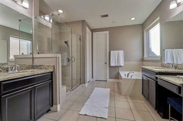 20210 Mariposa Blue Ln, Cypress, TX 77433 - bathroom with a shower stall, a garden tub, two vanities, and tile patterned flooring