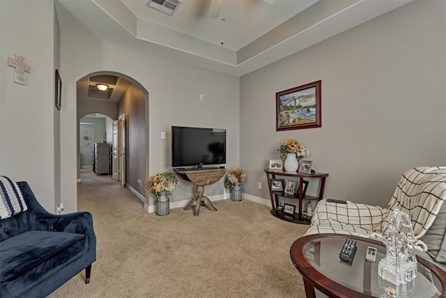 20210 Mariposa Blue Ln, Cypress, TX 77433 - carpeted living room featuring arched walkways and ceiling fan