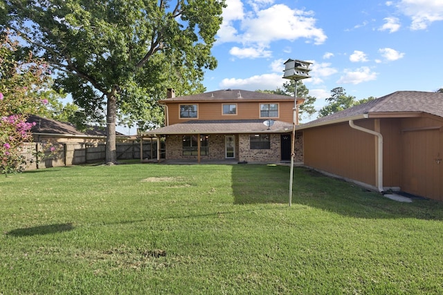 6995 Limerick Dr, Beaumont, TX 77706 - rear view of house featuring a chimney and roof with shingles