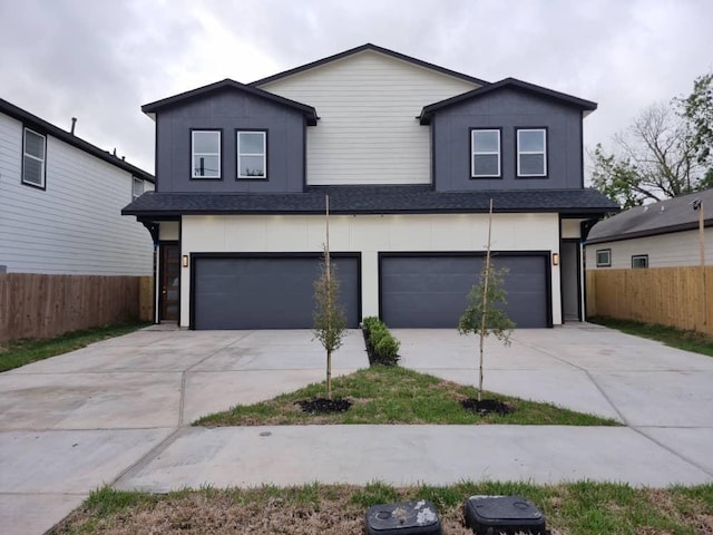 3013 Sparrow St, Houston, TX 77051 - view of front of property featuring an attached garage, driveway, and a shingled roof