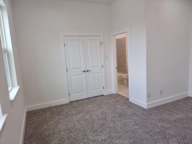 3013 Sparrow St, Houston, TX 77051 - unfurnished bedroom featuring carpet, a closet, and ensuite bathroom