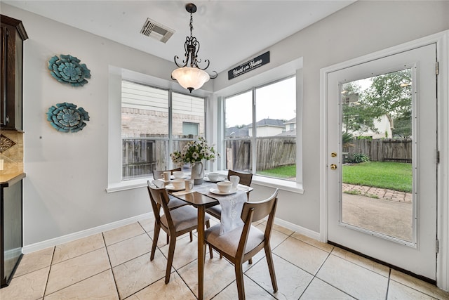 22406 Cascade Springs Dr, Katy, TX 77494 - dining space with plenty of natural light and light tile patterned flooring