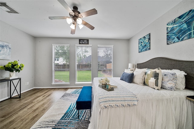 22406 Cascade Springs Dr, Katy, TX 77494 - bedroom featuring wood finished floors and a ceiling fan
