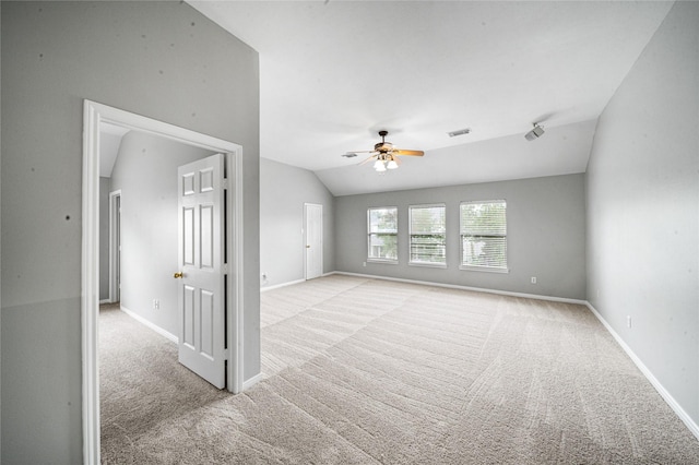 22406 Cascade Springs Dr, Katy, TX 77494 - spare room featuring light carpet, ceiling fan, and lofted ceiling