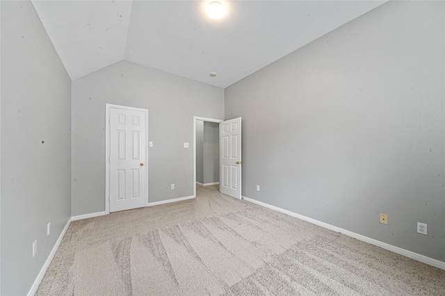 22406 Cascade Springs Dr, Katy, TX 77494 - unfurnished bedroom with light colored carpet and lofted ceiling