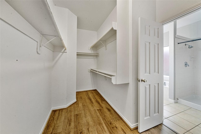 22406 Cascade Springs Dr, Katy, TX 77494 - walk in closet with wood finished floors