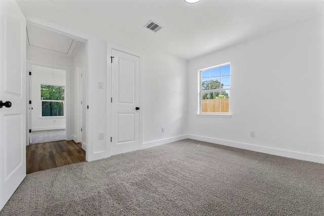 3112 Hays St, Pasadena, TX 77503 - unfurnished bedroom featuring attic access and carpet flooring