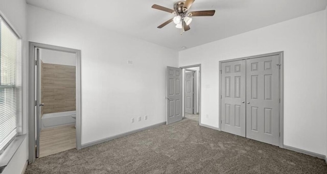 235 Calloway St, Houston, TX 77029 - unfurnished bedroom featuring carpet floors, a closet, ensuite bathroom, and ceiling fan