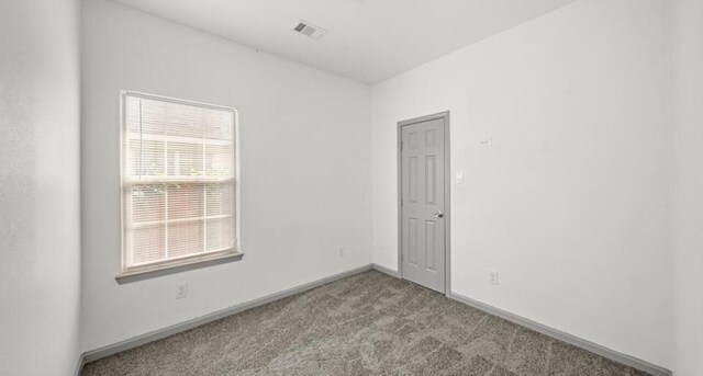 235 Calloway St, Houston, TX 77029 - unfurnished room with carpet flooring and baseboards