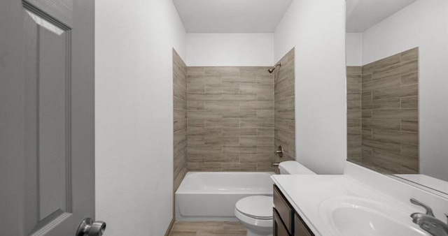 235 Calloway St, Houston, TX 77029 - full bathroom with vanity, washtub / shower combination, and wood finished floors