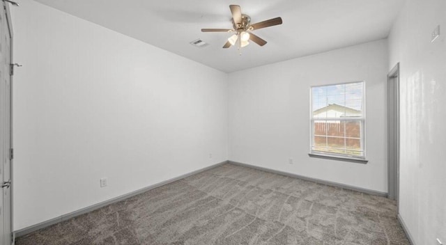 235 Calloway St, Houston, TX 77029 - spare room featuring carpet and a ceiling fan