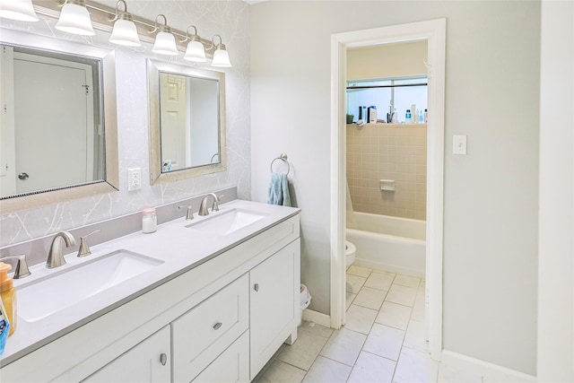 2706 Meadow Ln, La Marque, TX 77568 - full bathroom with double vanity and tub / shower combination