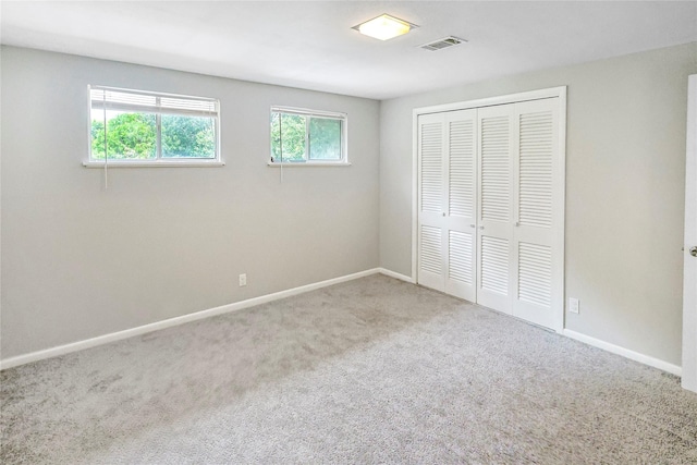 2706 Meadow Ln, La Marque, TX 77568 - unfurnished bedroom with carpet and a closet