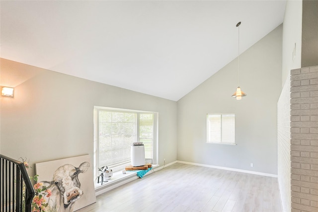 2706 Meadow Ln, La Marque, TX 77568 - unfurnished living room with high vaulted ceiling and light wood-style floors