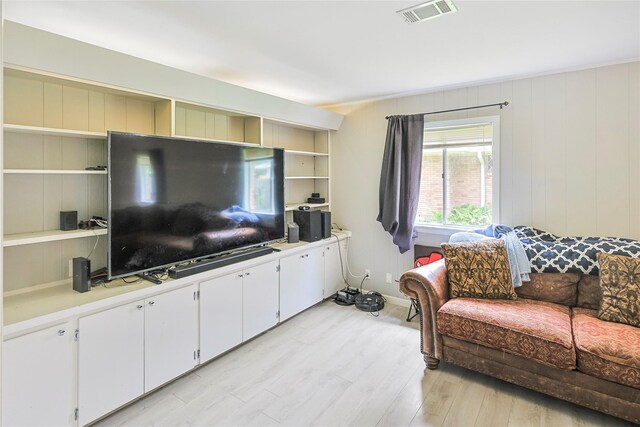2706 Meadow Ln, La Marque, TX 77568 - living area with light wood-type flooring and baseboards