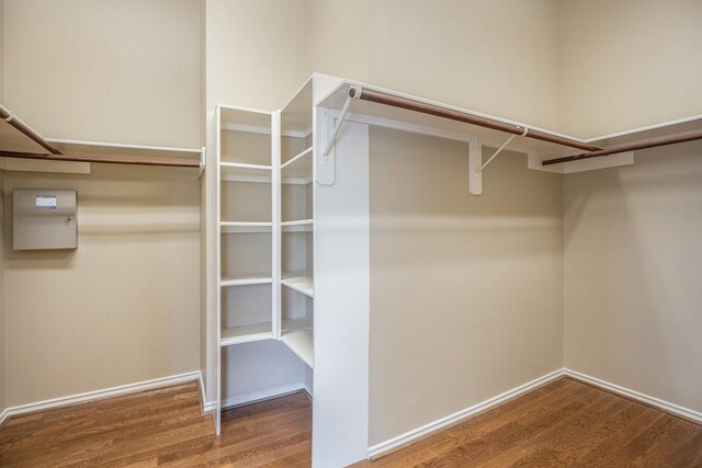 13604 Rainwater Dr, Pearland, TX 77584 - walk in closet featuring wood finished floors