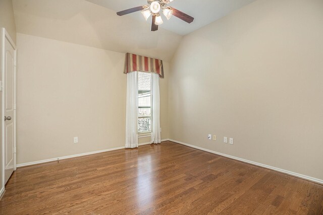 13604 Rainwater Dr, Pearland, TX 77584 - unfurnished room with wood finished floors, ceiling fan, and lofted ceiling
