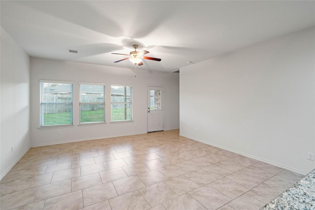182 Meadow Grove Dr, Conroe, TX 77384 - unfurnished room featuring ceiling fan and light tile patterned floors