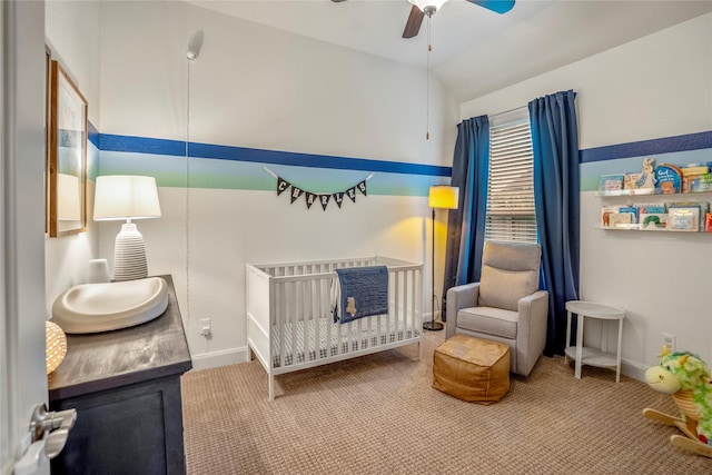 31218 Redwood Manor Ct, Spring, TX 77386 - carpeted bedroom featuring a crib, lofted ceiling, and a ceiling fan