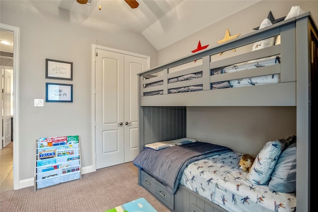 31218 Redwood Manor Ct, Spring, TX 77386 - bedroom with a closet, light colored carpet, vaulted ceiling, and ceiling fan
