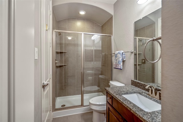 31218 Redwood Manor Ct, Spring, TX 77386 - bathroom with vanity, tile patterned floors, a shower stall, and a textured wall