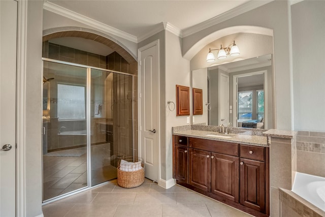 31218 Redwood Manor Ct, Spring, TX 77386 - full bath with vanity, a stall shower, a garden tub, tile patterned floors, and crown molding