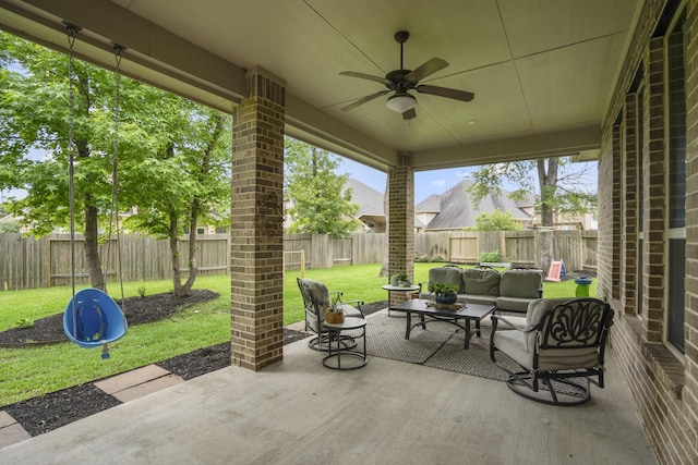 31218 Redwood Manor Ct, Spring, TX 77386 - fenced backyard with outdoor lounge area, a patio area, and ceiling fan