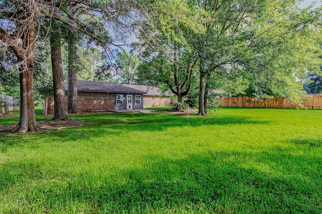 907 Kip Ln, Pinehurst, TX 77362 - view of yard