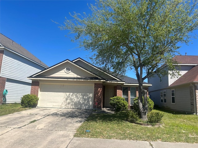 15806 Pin Oak Ridge St, Houston, TX 77073 - view of front of home featuring brick siding, an attached garage, driveway, and a front yard