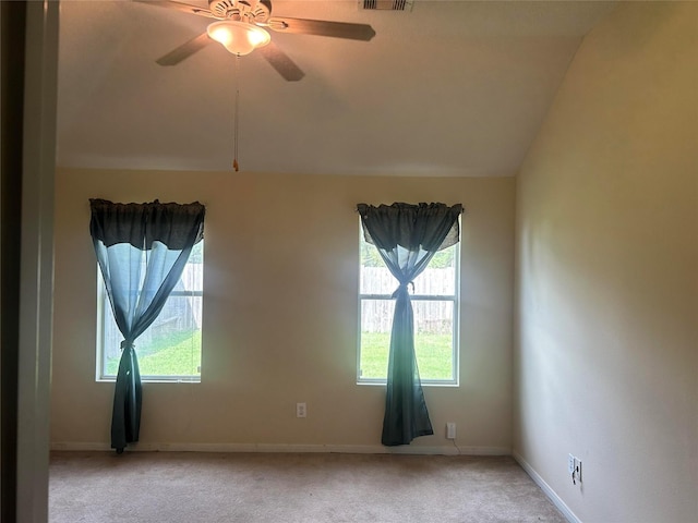 15806 Pin Oak Ridge St, Houston, TX 77073 - empty room with light carpet, a ceiling fan, and vaulted ceiling
