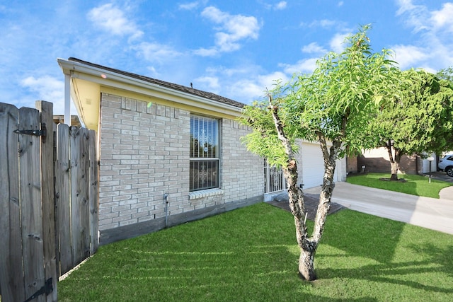 6643 Briar Glade Dr, Houston, TX 77072 - view of property exterior featuring concrete driveway, a garage, and brick siding