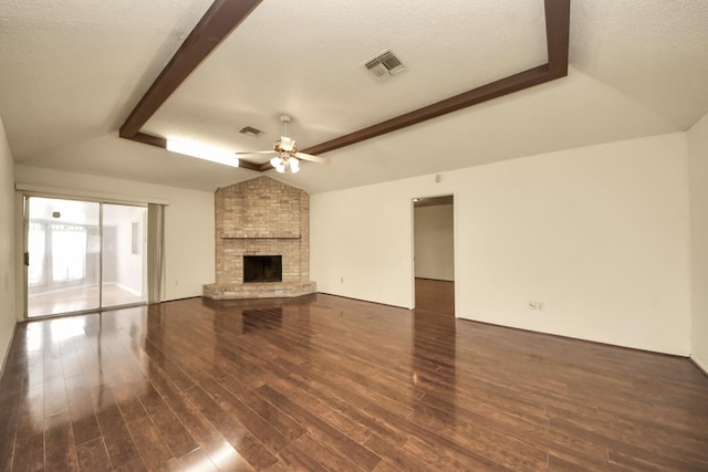 6643 Briar Glade Dr, Houston, TX 77072 - unfurnished living room featuring dark wood-type flooring, a ceiling fan, and a brick fireplace