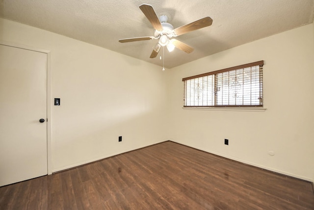 6643 Briar Glade Dr, Houston, TX 77072 - unfurnished room featuring dark wood-type flooring, a ceiling fan, and a textured ceiling