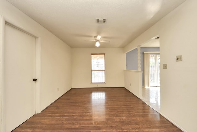 6643 Briar Glade Dr, Houston, TX 77072 - spare room with ceiling fan, healthy amount of natural light, and dark wood-style floors