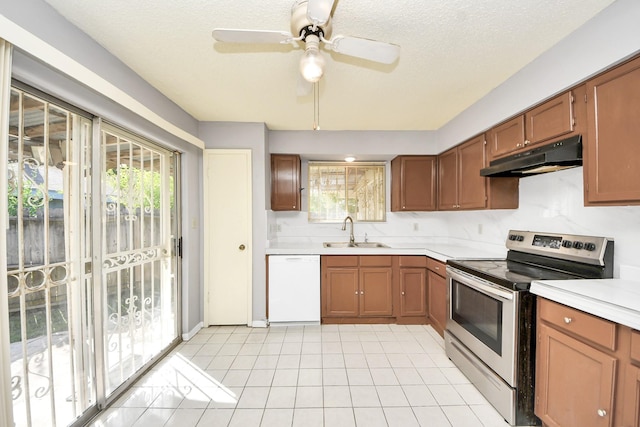 6643 Briar Glade Dr, Houston, TX 77072 - kitchen featuring stainless steel electric range oven, white dishwasher, under cabinet range hood, light countertops, and a textured ceiling