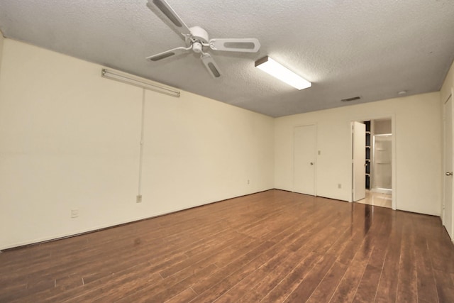 6643 Briar Glade Dr, Houston, TX 77072 - unfurnished bedroom with a textured ceiling, wood finished floors, and ceiling fan