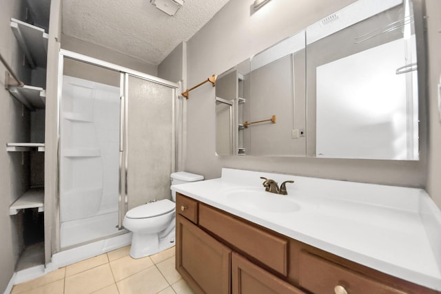 6643 Briar Glade Dr, Houston, TX 77072 - bathroom featuring vanity, a shower stall, tile patterned floors, and a textured ceiling