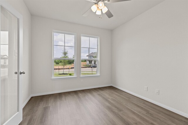4625 Peony Green Dr, Katy, TX 77493 - unfurnished room with wood finished floors and ceiling fan