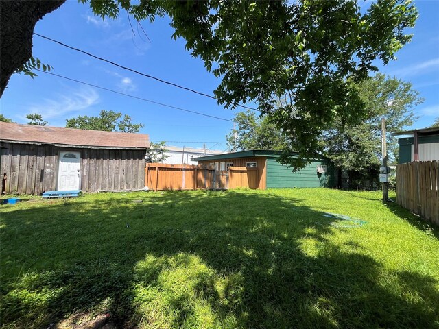 16305 De Zavalla Rd, Channelview, TX 77530 - view of yard with an outdoor structure